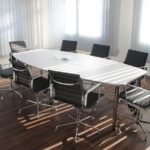 board table with eight chairs